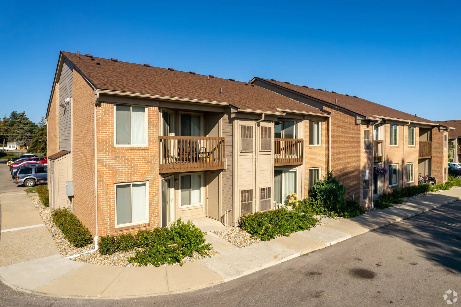 Exterior of Warren Village Apartments, a community managed by The Ivanhoe Companies